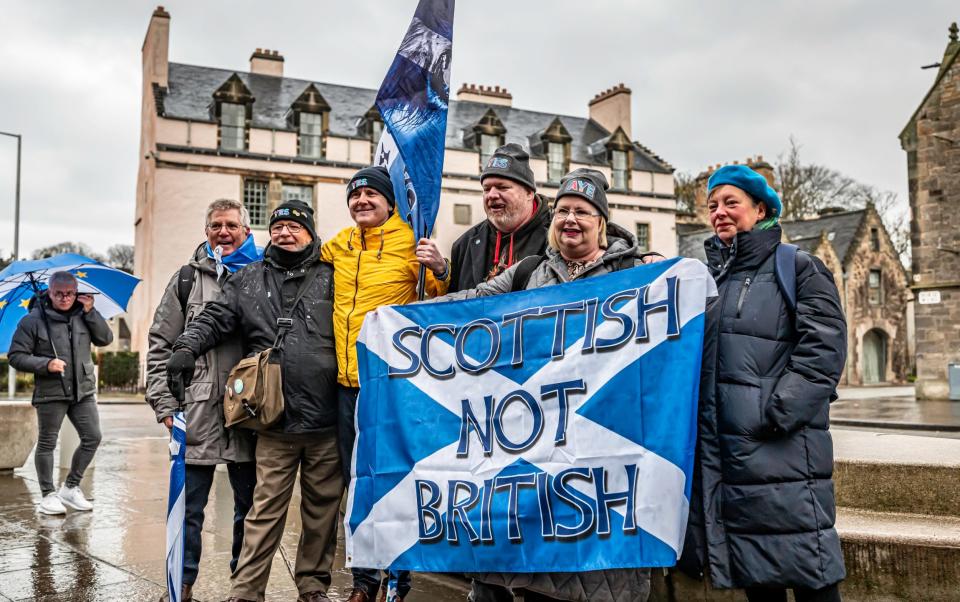 Scottish independence supporters gather outside the Scottish Parliament - Chris Strickland
