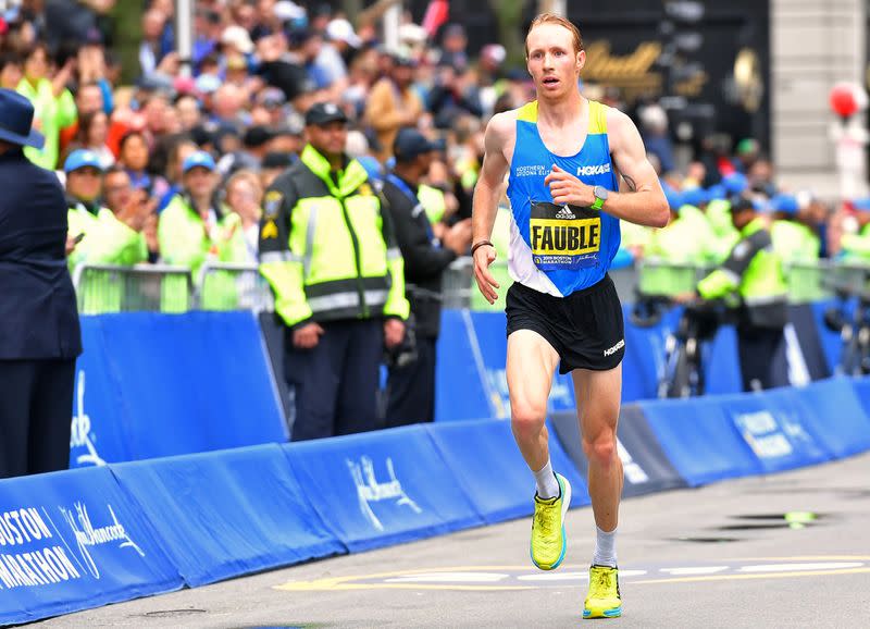 Scott Fauble cf the U.S.A. crosses the finish line in seventh place during the 123rd running of the Boston Marathon on the sixth anniversary of the 2013 Boston marathon bombings in Boston