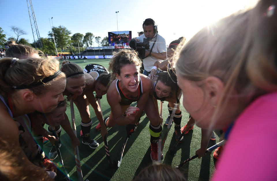 AMSTELVEEN, NETHERLANDS - JUNE 27: Janne Muller-Wieland of Germany gives a team talk to her team mates during the Women's FIH Field Hockey Pro League semi final match between Netherlands and Germany at Wagener Stadium on June 27, 2019 in Amstelveen, Netherlands. (Photo by Charles McQuillan/Getty Images)