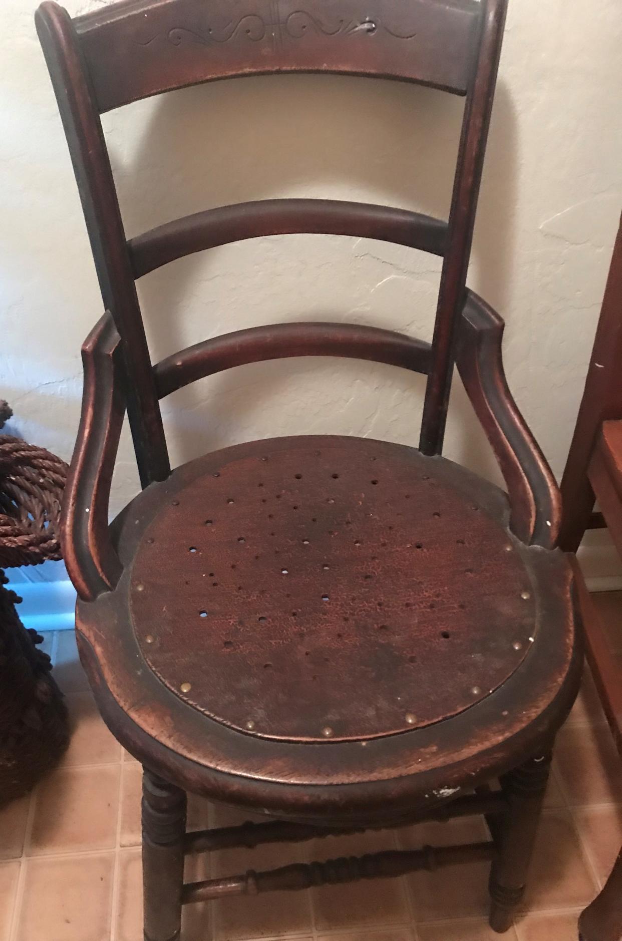 The style of this chair is Renaissance Revival that became popular after the Civil War.