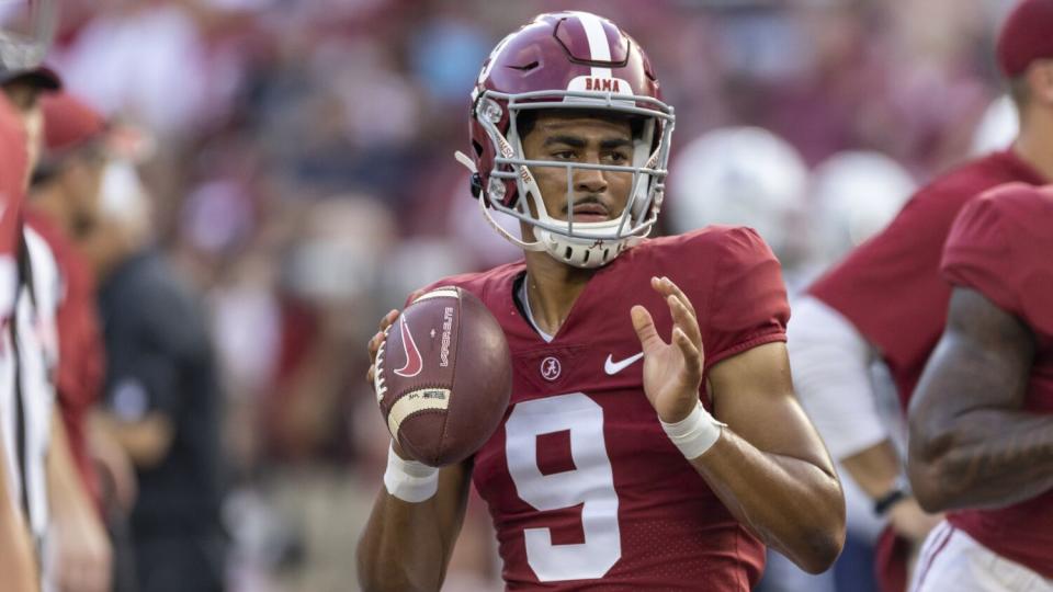 Alabama quarterback Bryce Young warms up before a win over Utah State on Sept. 3.