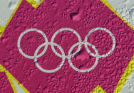 Condensation is seen on an Olympic rings logo outside the Olympic Stadium on March 19, 2012 in London, England. (Photo by Julian Finney/Getty Images)