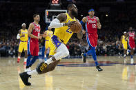 Los Angeles Lakers' LeBron James goes to the basket during the first half of an NBA basketball game against the Philadelphia 76ers, Saturday, Jan. 25, 2020, in Philadelphia. (AP Photo/Chris Szagola)