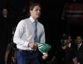 June 23, 2017; Chicago, IL, USA; Miro Heiskanen walks to the stage after being selected as the number three overall pick to the Dallas Stars in the first round of the 2017 NHL Draft at the United Center. Mandatory Credit: David Banks-USA TODAY Sports