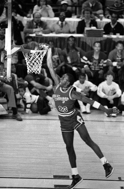 Michael Jordan wows the crowd at Market Square Arena in the 1985 NBA Slam Dunk Contest during the All-Star weekend Feb. 9, 1985 Jeff Atteberry/The Star