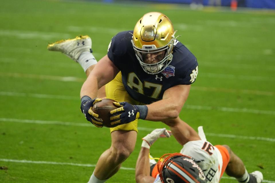 Notre Dame tight end Michael Mayer plays against Oklahoma State in the Fiesta Bowl on Jan. 1, 2022.