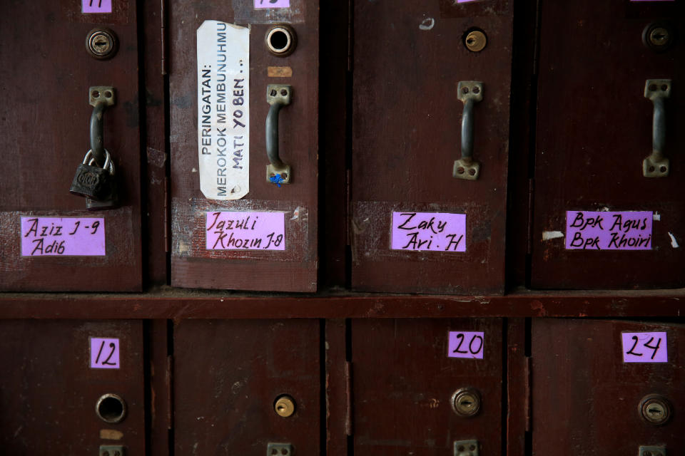 <p>Student’s lockers are seen at Lirboyo Islamic boarding school in Kediri, Indonesia, May 18, 2018. (Photo: Beawiharta/Reuters) </p>