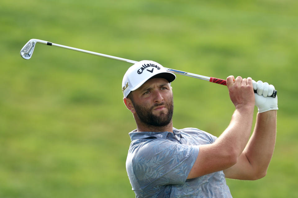 Jon Rahm follows his tee shot on the 15th hole during a Pro-Am on Aug. 17. (Rob Carr/Getty Images)