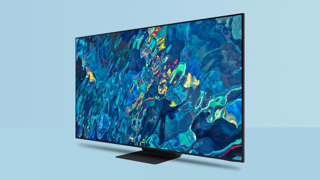 Samsung QN95B TV on blue background. 