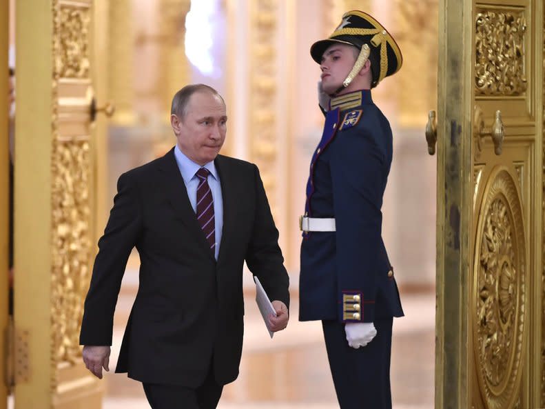 Russia's President Vladimir Putin arrives to chair a meeting of the Pobeda (Victory) Organising Committee, with a focus on developing humanitarian cooperation at the government and public level with other countries, in order to promote objective information on Russia’s history and present, including its role in the victory over Nazism, at the Kremlin in Moscow on April 20, 2017. REUTERS/Alexander Nemenov/Pool