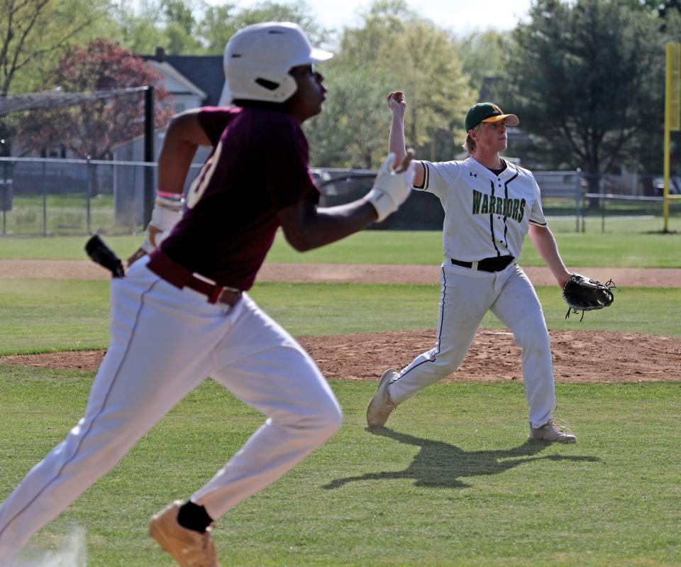 Mardela's Evan Birch (15) throws to first for the out against Washington Monday, April 17, 2023, in Mardela Springs, Maryland. Washington defeated Mardela 8-1.