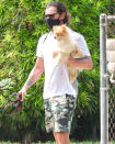 <p>Gavin Rossdale takes his pup to the tennis courts on Monday in L.A.</p>