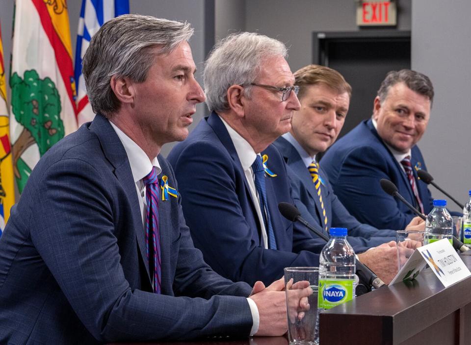 Nova Scotia Premier Tim Houston, New Brunswick Premier Blaine Higgs, Newfoundland and Labrador Premier Andrew Furey and Prince Edward Island Premier Dennis King, left to right,  field questions at the closing news conference at a meeting of the Council of Atlantic Premiers in Halifax in March. 