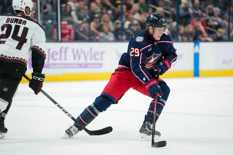 Nov 16, 2023; Columbus, Ohio, USA; Columbus Blue Jackets right wing Patrik Laine (29) controls the puck in front of Arizona Coyotes defenseman Matt Dumba (24) during the first period of the NHL hockey game at Nationwide Arena.