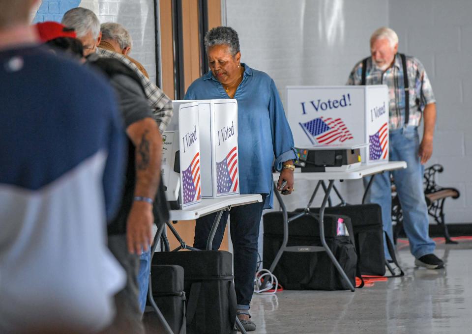 Sandra Gantt, middle, on her last day of being on the town council, votes with others at Pendleton Elementary School in Pendleton, S.C. Tuesday, November 7, 2023. Residents in Pendleton voted for town council, plus whether or not to approve a bond referendum to help Anderson School District 4 with $148 million over 25 years.