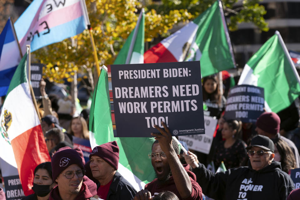 Immigrants who have been in the U.S. for years, rally asking for work permits for Deferred Action for Childhood Arrivals (DACA), and Temporary Protected Status (TPS), programs at Franklin Park in Washington, Tuesday, Nov. 14, 2023. (AP Photo/Jose Luis Magana)