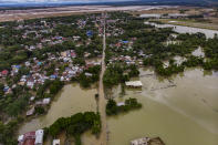 TUGUEGARAO, PHILIPPINES - NOVEMBER 16: An aerial view of flooded houses after Typhoon Vamco hit on November 16, 2020 in Tuguegarao, Cagayan province, Philippines. The Cagayan Valley region in northern Philippines saw its worst flooding in 48 years after a dam released massive amounts of rainwater brought about by Typhoon Vamco. The country continues to reel from the widespread destruction caused by this year's deadliest cyclone which has killed at least 67 people. (Photo by Ezra Acayan/Getty Images)