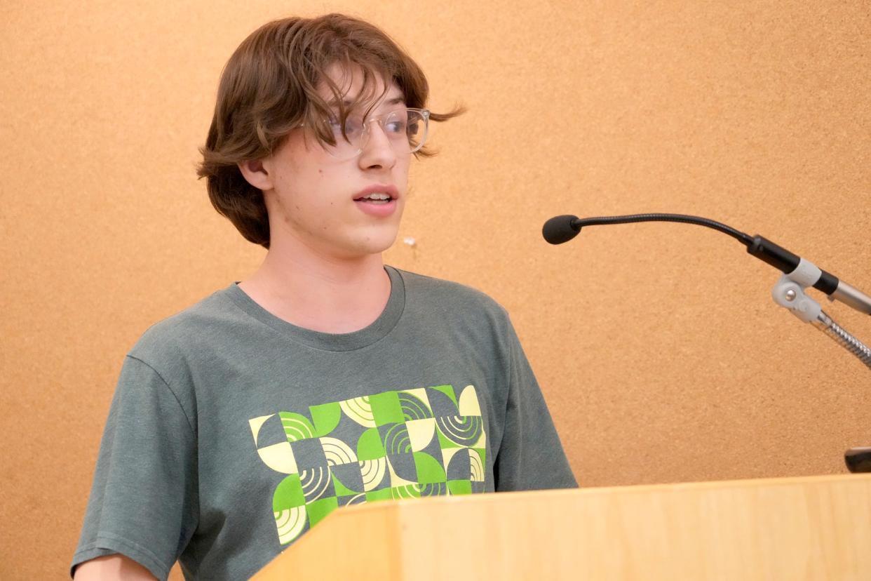 High school student Owen Driscoll speaks against a plan by the for-profit Arizona College of Nursing to open a new location in Milwaukee during a meeting of the city's plan commission in Milwaukee on Monday.