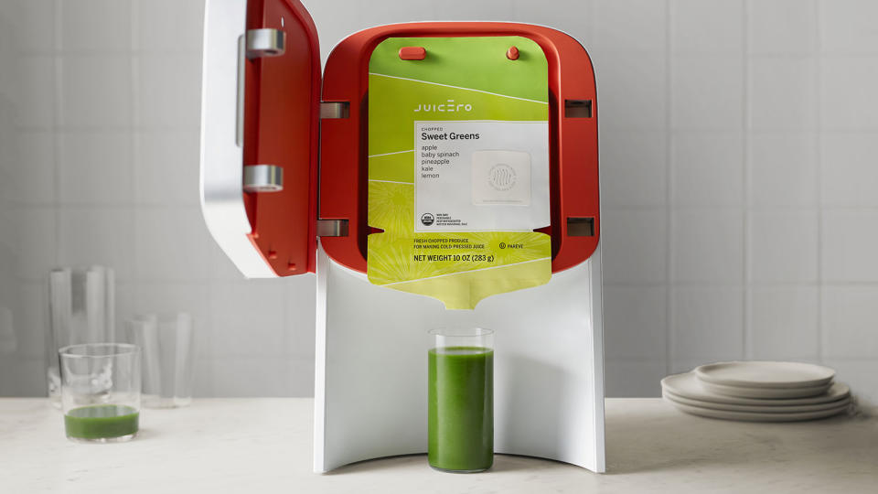 The press may have look good, but a pair of hands can do its job. Source: Juicero