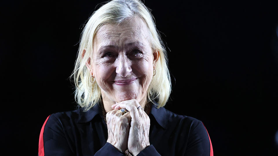 Martina Navratilova smiles during a presentation.