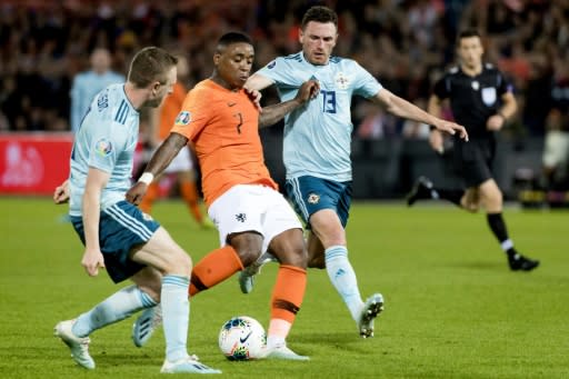 Tottenham's major move of the window was the signing of Dutch internationaln winger Steven Bergwijn (centre)