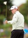 Lee Westwood of England reacts to making a birdie putt on the 2nd green during his first round on the opening day of the 2012 Open Championship at Royal Lytham & St Anne's in Lytham