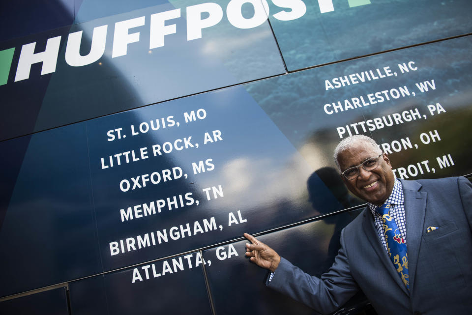 Birmingham Mayor William Bell points to his city's name on the HuffPost bus.