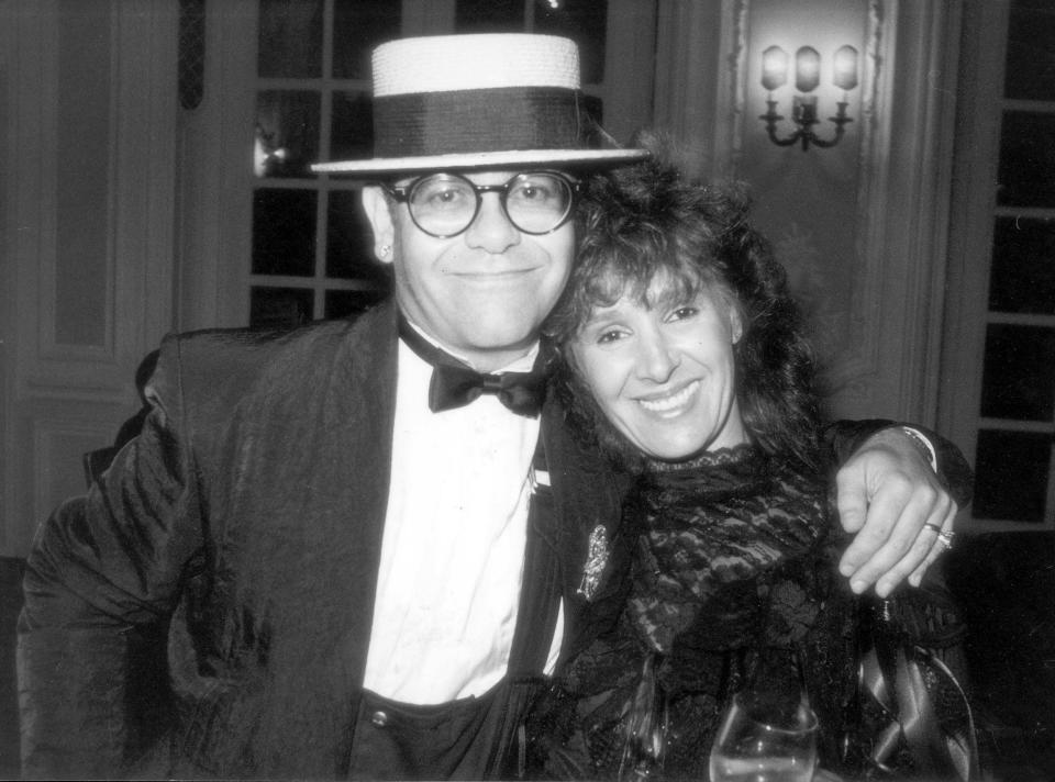 Phillips pictured with singer Elton John in 1984