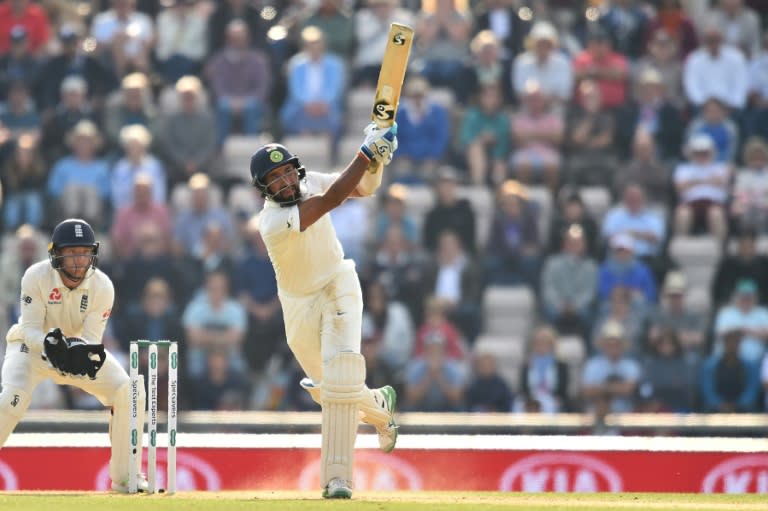 India's Cheteshwar Pujara goes to his hundred on the second day of the fourth Test against England at Southampton