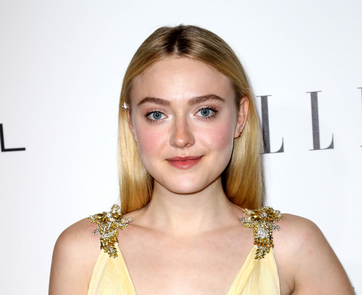 Dakota Fanning looks back on her first kiss playing a young Reese Witherspoon