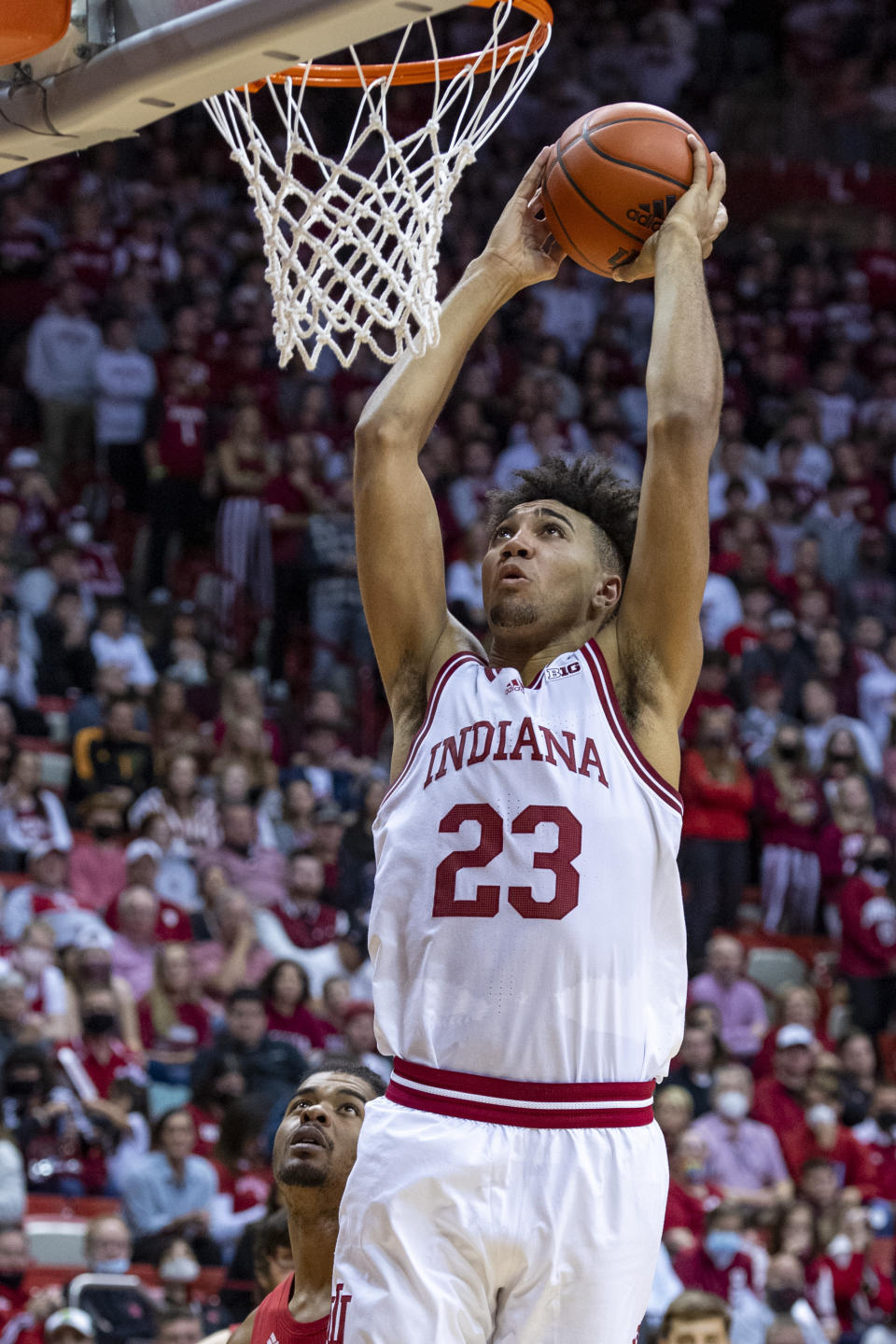 Indiana forward Trayce Jackson-Davis (23) dunks during the second half of a NCAA college basketball game against Nebraska, Saturday, Dec. 4, 2021, in Bloomington, Ind. (AP Photo/Doug McSchooler)