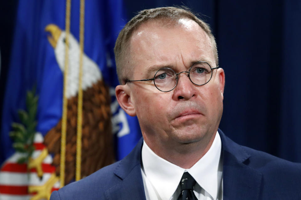 FILE- In this July 11, 2018, file photo Mick Mulvaney, acting director of the Consumer Financial Protection Bureau (CFPB), and Director of the Office of Management, listens during a news conference at the Department of Justice in Washington. White House chief of staff Mulvaney said in an interview with "Fox News Sunday" Democrats will "never" see President Donald Trump's tax returns. Mulvaney says Democrats just want "attention" and are engaging in a "political stunt" after the chairman of the House Ways and Means Committee, Rep. Richard Neal, asked the IRS to provide six years of Trump's personal tax returns and the returns for some of his businesses. (AP Photo/Jacquelyn Martin, File)