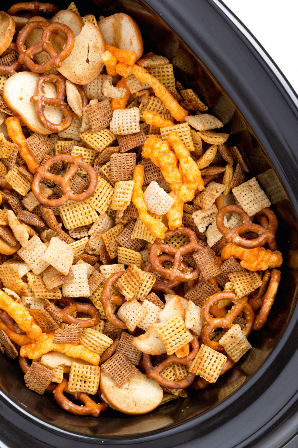 <p>Make it even easier to inhale this snack by prepping a batch big enough to actually stick around for awhile.</p><p>Get the recipe from <a rel="nofollow noopener" href="http://www.delish.com/cooking/recipe-ideas/recipes/a44362/slow-cooker-chex-mix-recipe/" target="_blank" data-ylk="slk:Delish;elm:context_link;itc:0;sec:content-canvas" class="link ">Delish</a>.</p>