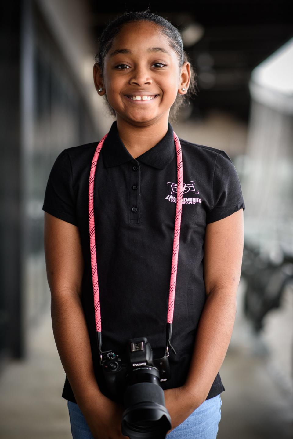 Christina Woods, 9, at the 100 Professional Black Women in Black Photo Shoot in downtown Fayetteville on Saturday, Jan. 6, 2024.