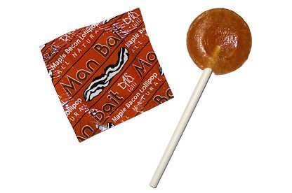 A lollipop for those younger bacon lovers.   <a href="http://www.amazon.com/Man-Bait-Bacon-Lollipop-lollipop/dp/B002P23I50/ref=sr_1_9?ie=UTF8&qid=1354634414&sr=8-9&keywords=bacon">Amazon.com</a>, <strong>$0.50</strong> 