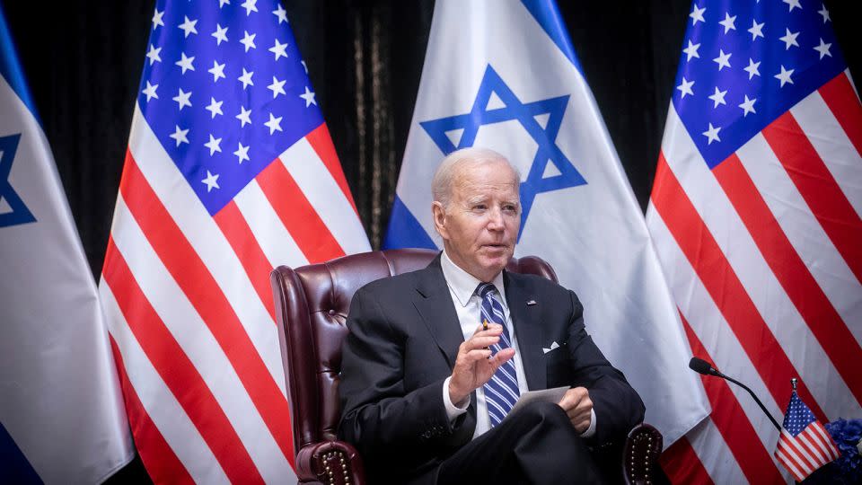 US President Joe Biden speaks during a meeting with Israeli Prime Minister Benjamin Netanyahu to discuss the war between Israel and Hamas, in Tel Aviv, Israel, on October 18. - Miriam Alster/AP