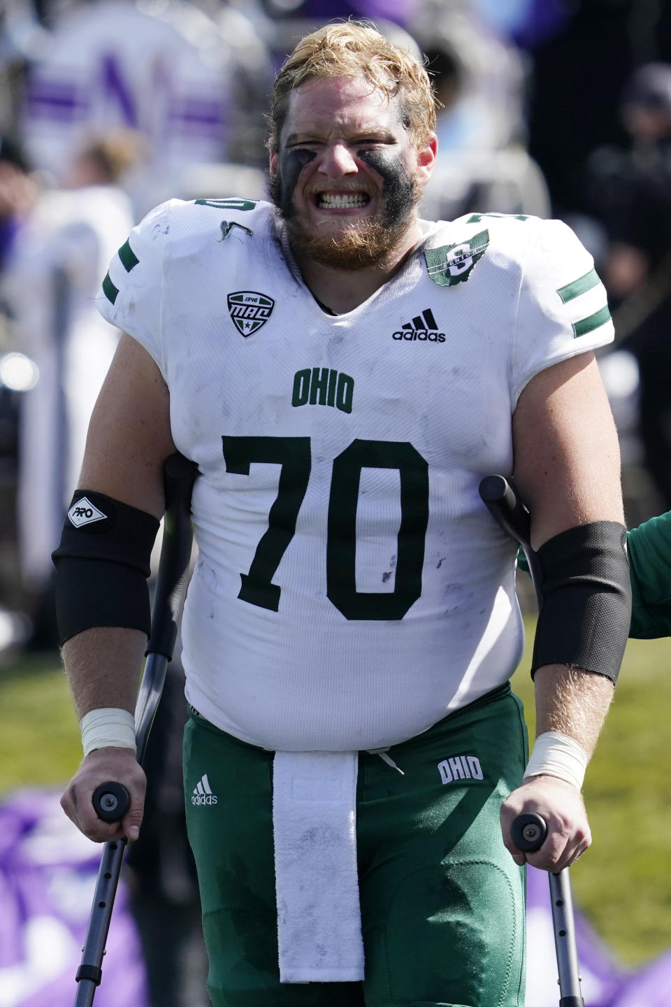 Ohio offensive lineman Nick Sink walks off the field after getting injured during the first half of an NCAA college football game against Northwestern in Evanston, Ill., Saturday, Sept. 25, 2021. (AP Photo/Nam Y. Huh)