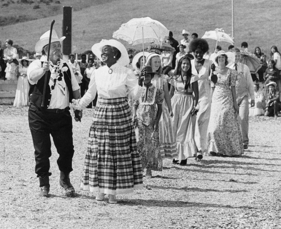 Charles Dederich (front, left) founder of Synanon, and wife Betty (his right) lead a wedding parade at the Synanon Wedding Festival, August 6, 1972.<span class="copyright">Greg Peterson/San Francisco Chronicle—Getty Images</span>