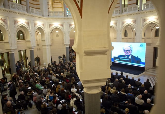 The UN court’s conviction and sentencing of ex-Bosnian Serb leader Radovan Karadzic is broadcast in the city hall in Sarajevo