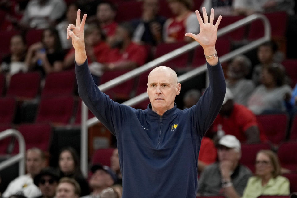 Indiana Pacers coach Rick Carlisle gives instructions during the first half of the team's NBA preseason basketball game against the Houston Rockets, Tuesday, Oct. 10, 2023, in Houston. (AP Photo/Eric Christian Smith)