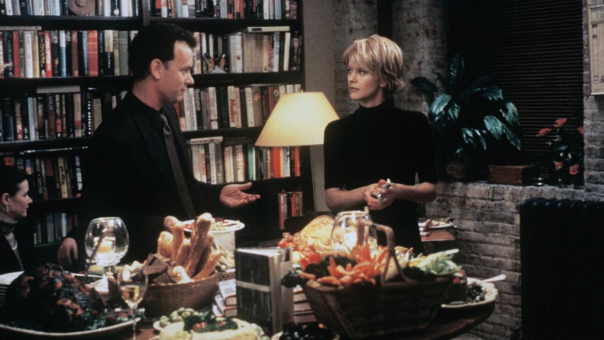  You've Got Mail image, shwing Rom Hands and Meg Ryan in a book store. 