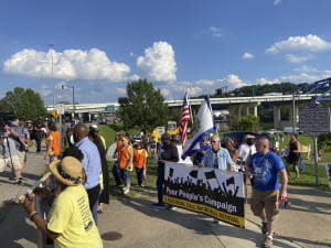 Protesters marching against Sen. Joe Manchin.