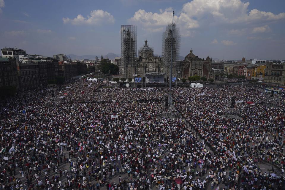 People gather at the capital's main square, the Zócalo, as they listen to Mexican President Andrés Manuel López Obrador in Mexico City, Sunday, November 27, 2022. (AP Photo / Marco Ugarte)