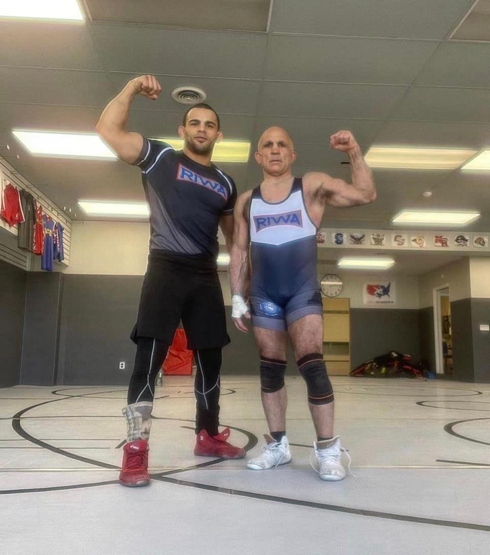John Laurenzi (right) training with Olympic wrestler Eyad Ibrahim (left) at the Rockland International Wrestling Academy.