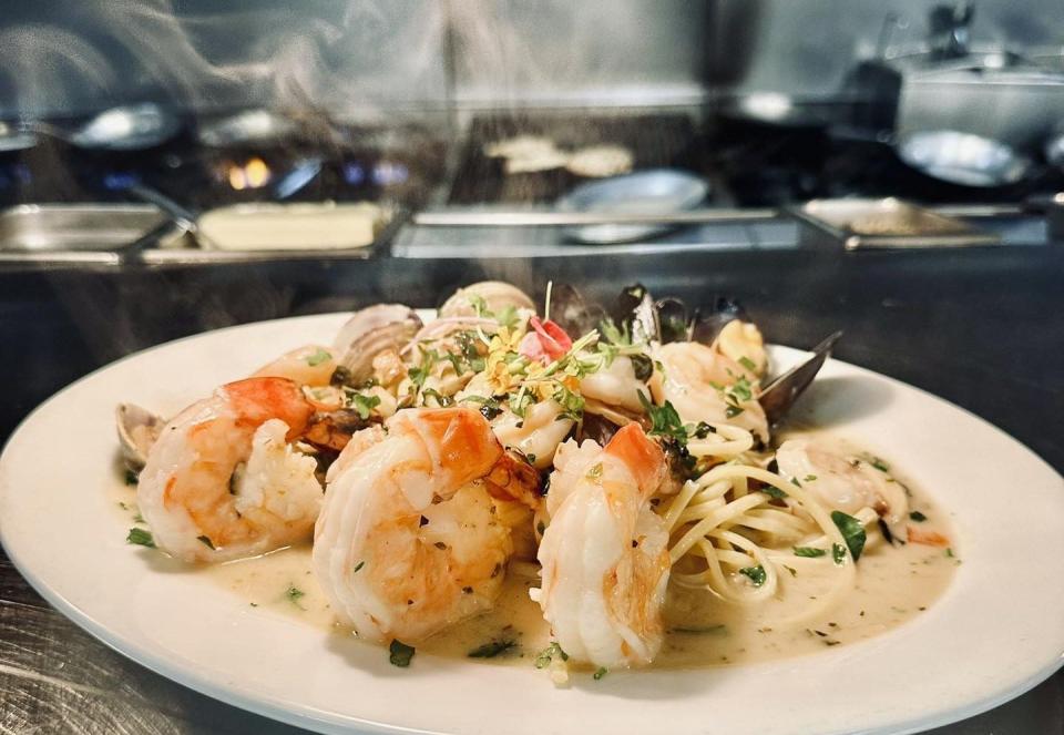 Hot from the kitchen at Il Bellagio in West Palm Beach: jumbo shrimp, clams and mussels over linguine in scampi sauce. The restaurant will close its longtime location at the former CityPlace plaza and move to a new space just steps away.