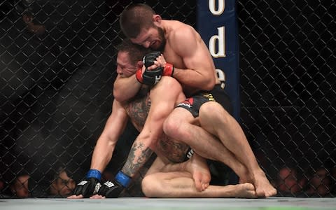 McGregor conceded after Nurmagomedo's choke hold in the fourth round - Credit:  Jeff Bottari