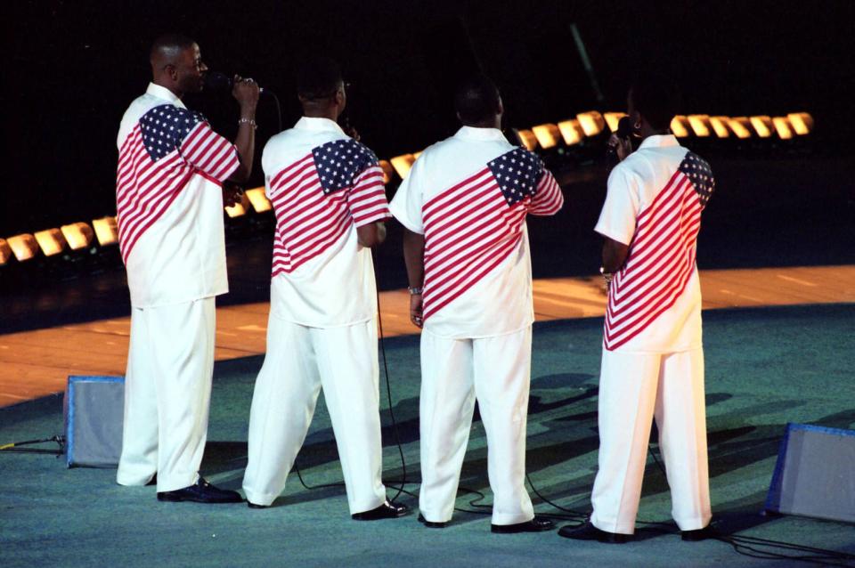 R&B vocal group, Boyz II Men, performing the national athem at the 1996 Olympics closing ceremony, Atlanta, Georgia, August 4, 1996. Photo by John Spink/jspink@ajc.com