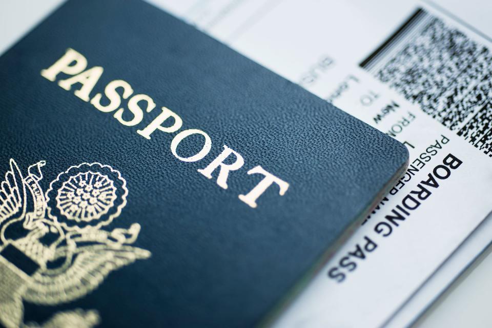 American passport with boarding pass inside