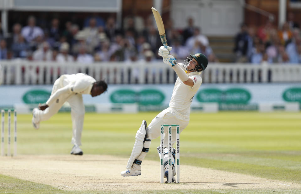 Australia's Steve Smith hits a ball from England's Jofra Archer during play on day four of the 2nd Ashes Test cricket match between England and Australia at Lord's cricket ground in London, Saturday, Aug. 17, 2019. (AP Photo/Alastair Grant)