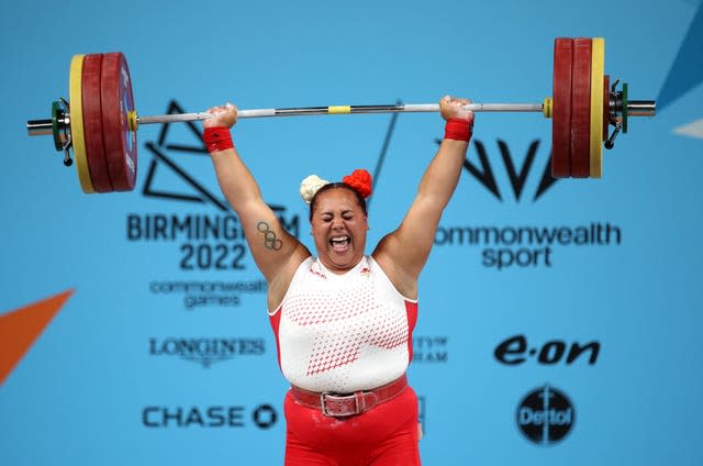 Emily Campbell grimaces as she lifts weights at the 2022 Commonwealth Games in Birmingham